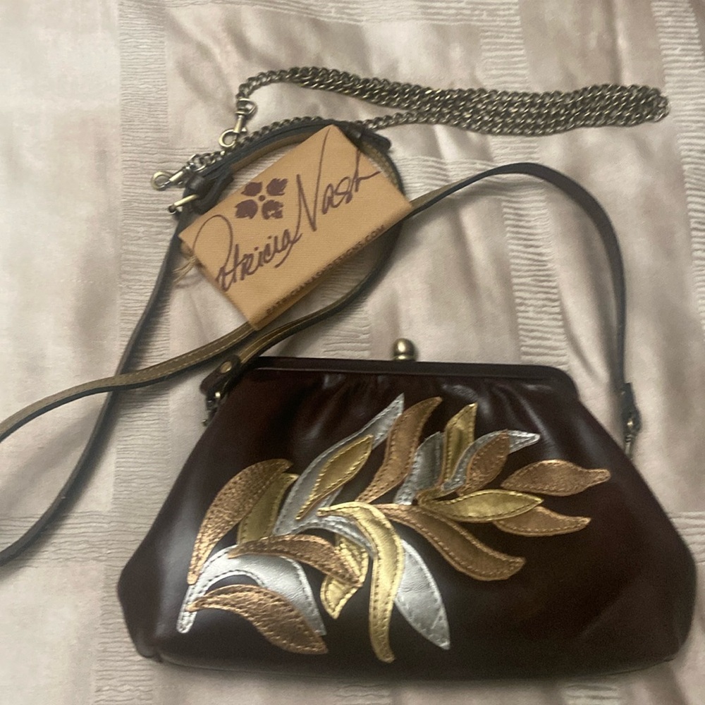 Patricia Nash crossbody or clutch bag.Beautiful gold and silver leaf designs.